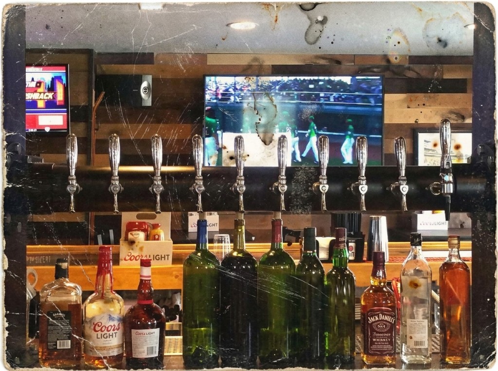Industrial tap rail at Iezzi's bar